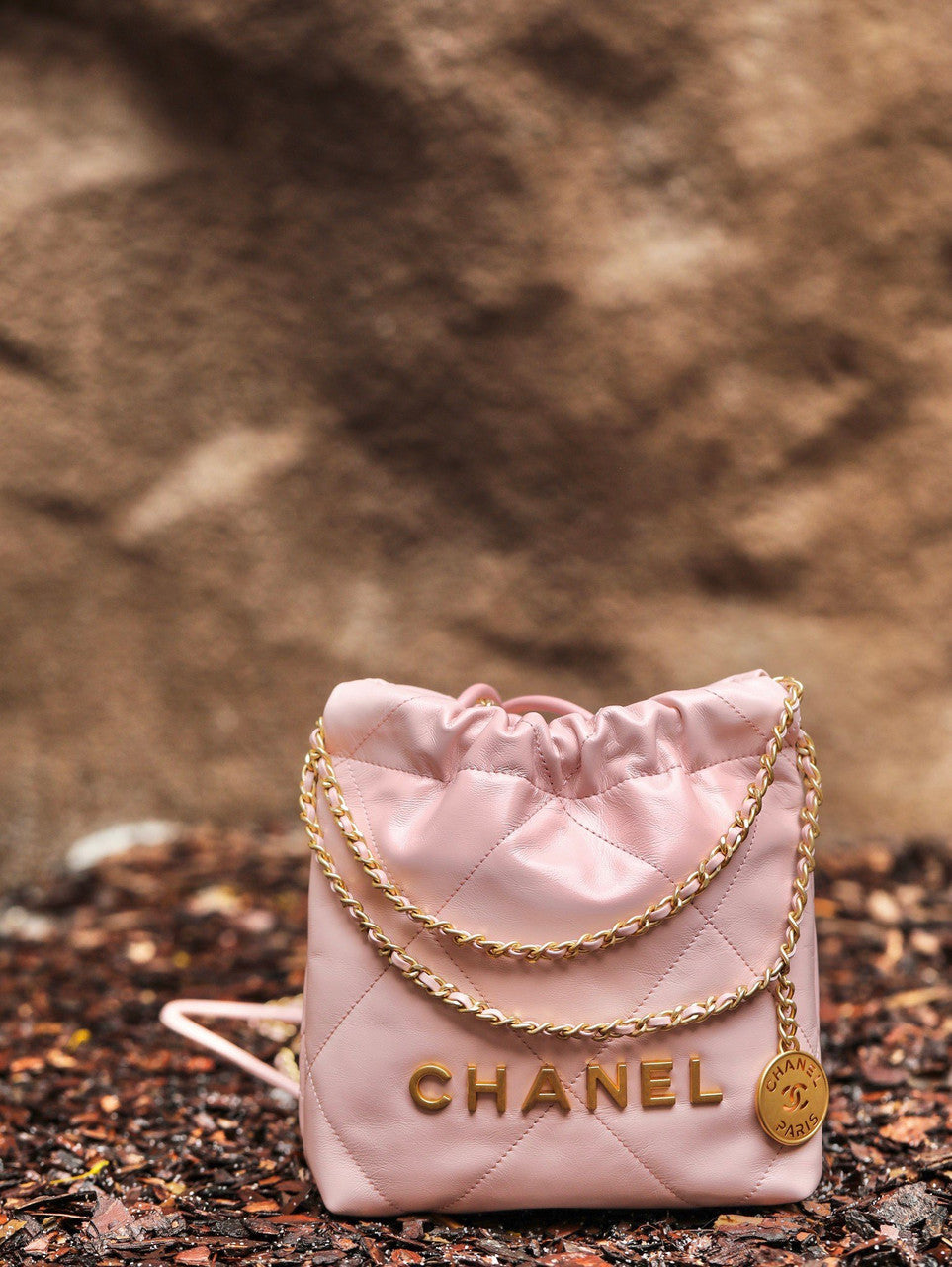 CHANEL 22 MINI HANDBAG GOLD LOGO SS2023 PINK