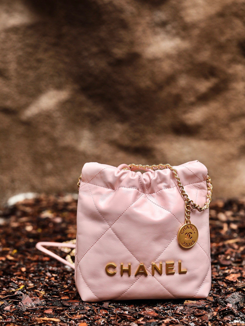 CHANEL 22 MINI HANDBAG GOLD LOGO SS2023 PINK