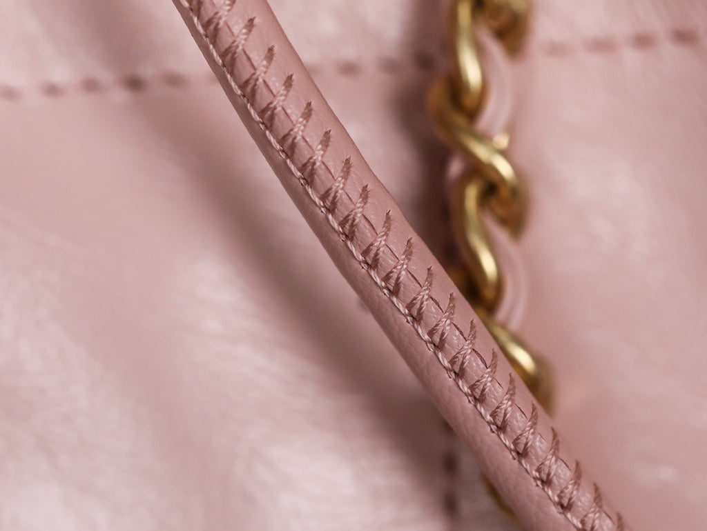 CHANEL 22 MINI HANDBAG GOLD LOGO SS2023 PINK