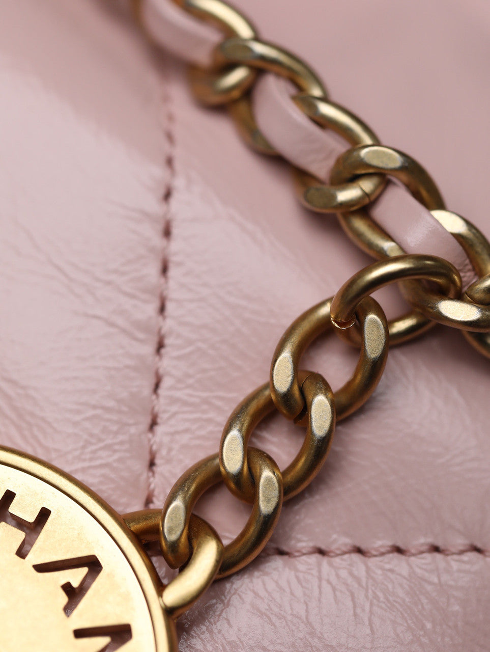 CHANEL 22 MINI HANDBAG GOLD LOGO SS2023 PINK