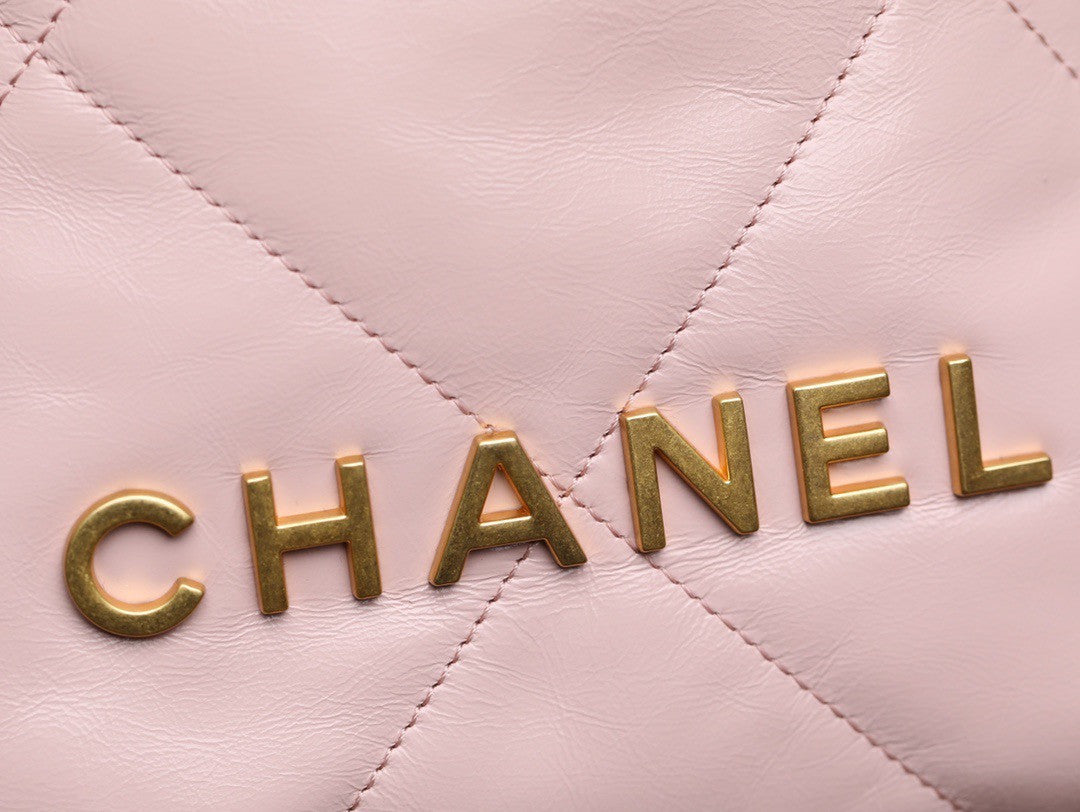CHANEL 22 MINI HANDBAG GOLD LOGO SS2023 PINK
