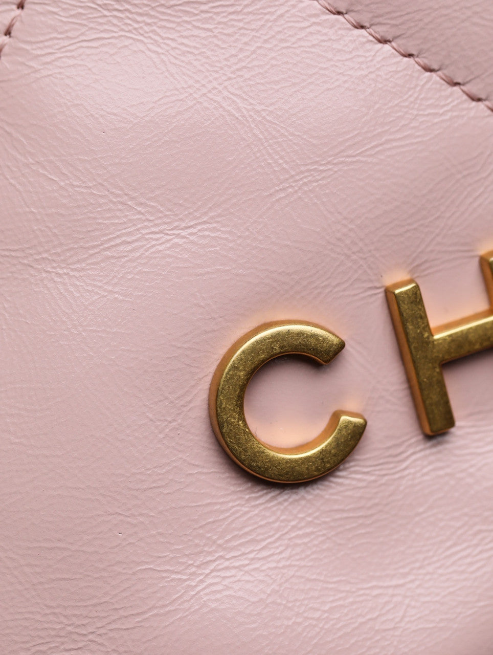 CHANEL 22 MINI HANDBAG GOLD LOGO SS2023 PINK
