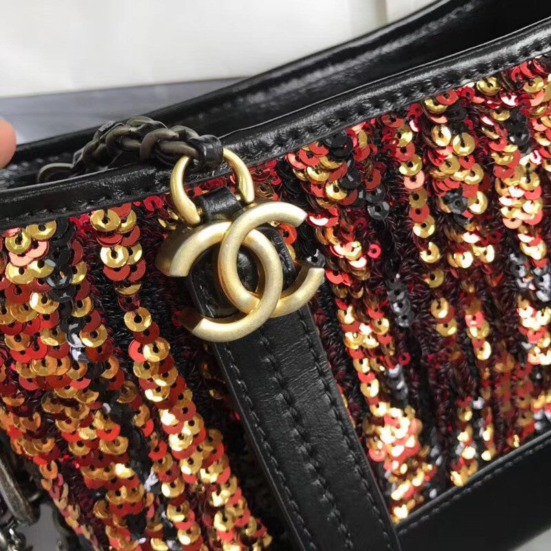 Chanel's Gabrielle Small Orange Sequins Hobo Bag A91810