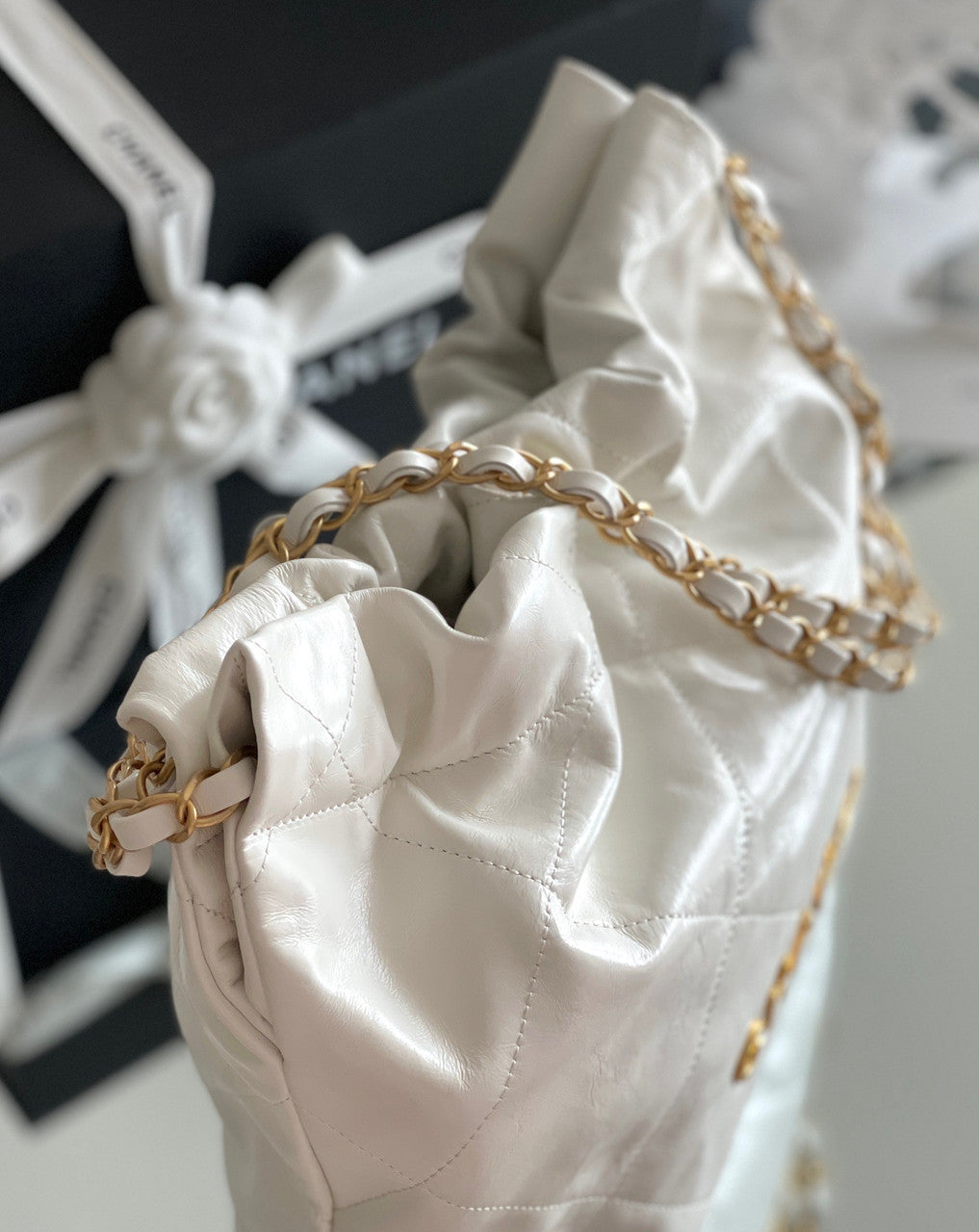 Chanel CHANEL 22 SMALL WHITE HANDBAG WITH GOLD HARDWARE