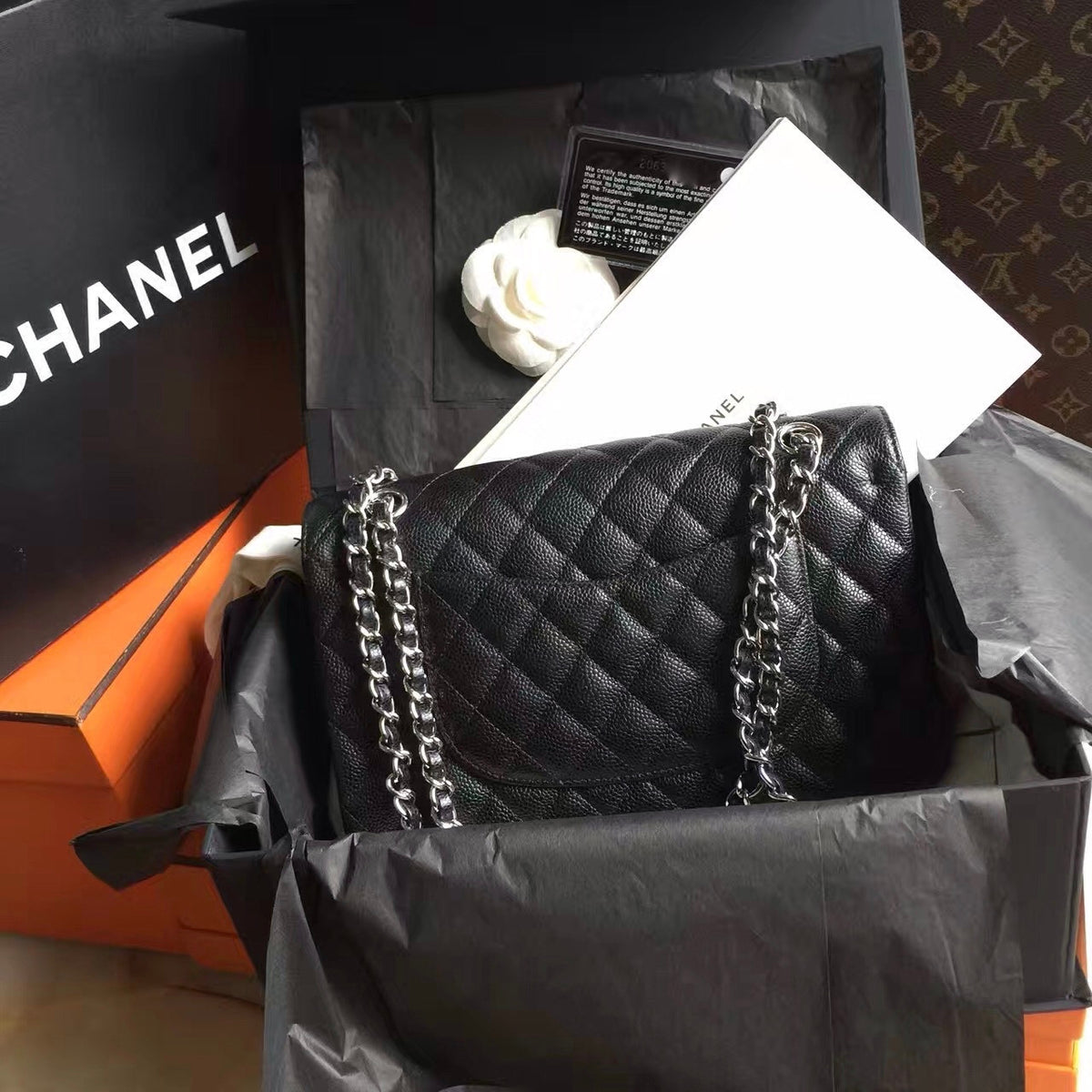 CHANEL Classic Flap Bag Black Caviar Leather with Silver HW Medium A01112