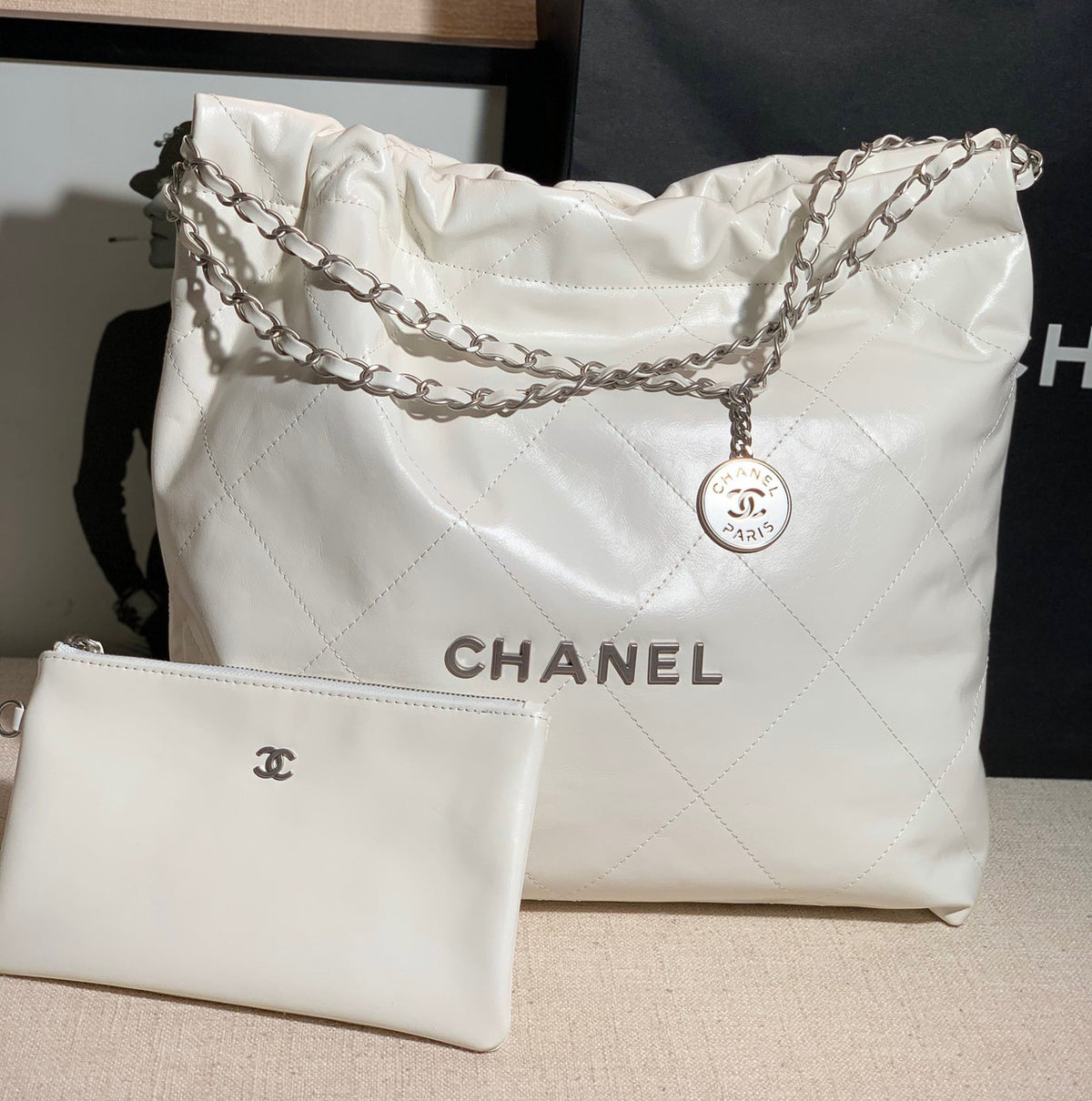 CHANEL 22 SMALL HANDBAG SILVER LOGO WHITE CALF