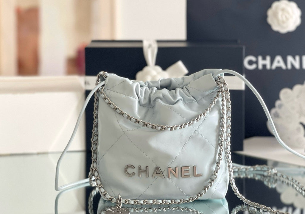 CHANEL 22 MINI HANDBAG SILVER LOGO SS2024 LIGHT BABY BLUE