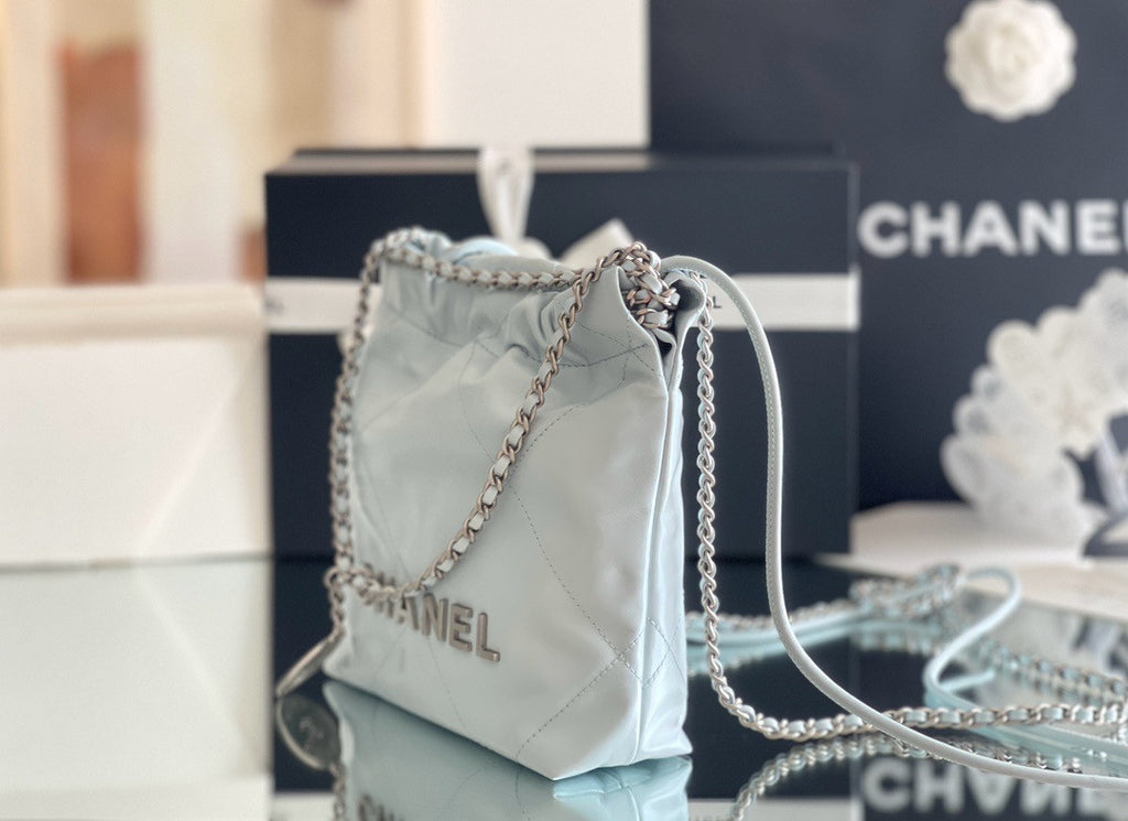CHANEL 22 MINI HANDBAG SILVER LOGO SS2024 LIGHT BABY BLUE