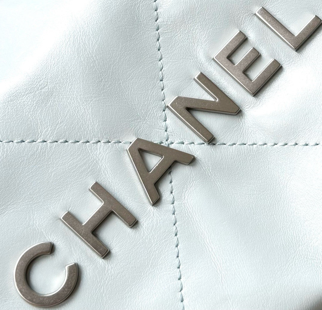 CHANEL 22 MINI HANDBAG SILVER LOGO SS2024 LIGHT BABY BLUE