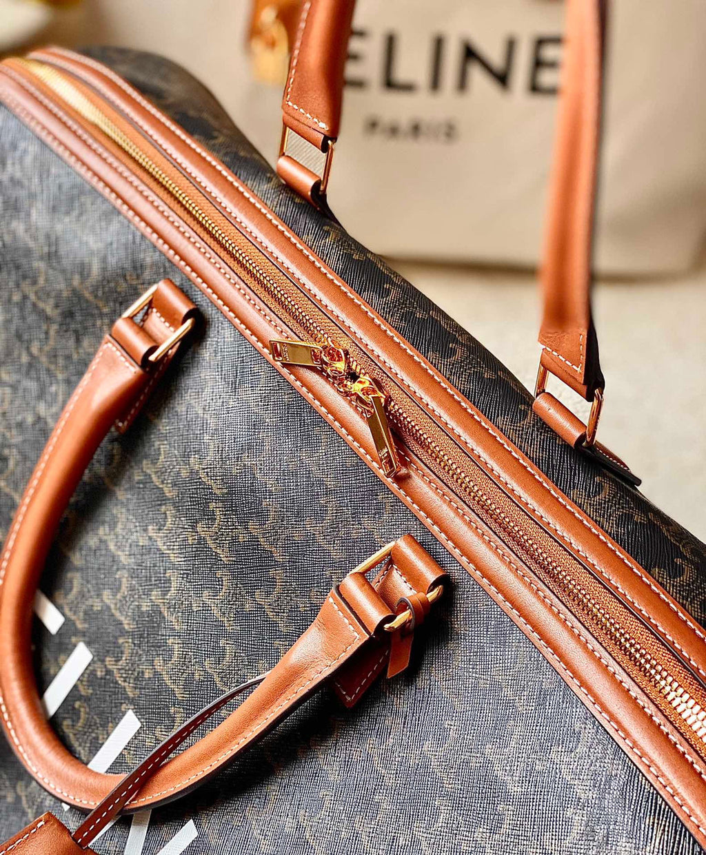 CELINE TRAVEL 50 IN TRIOMPHE CANVAS TAN