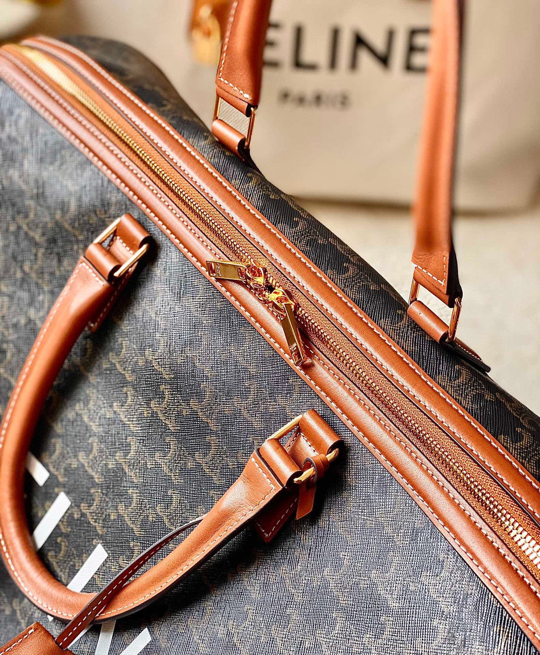 CELINE TRAVEL 50 IN TRIOMPHE CANVAS TAN