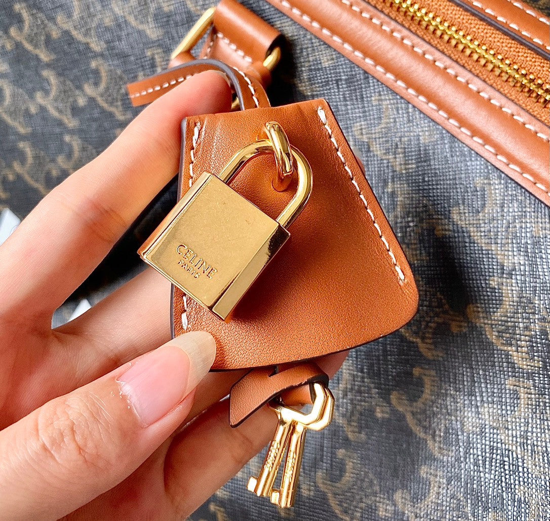 CELINE TRAVEL 50 IN TRIOMPHE CANVAS WITH CAT PRINT TAN