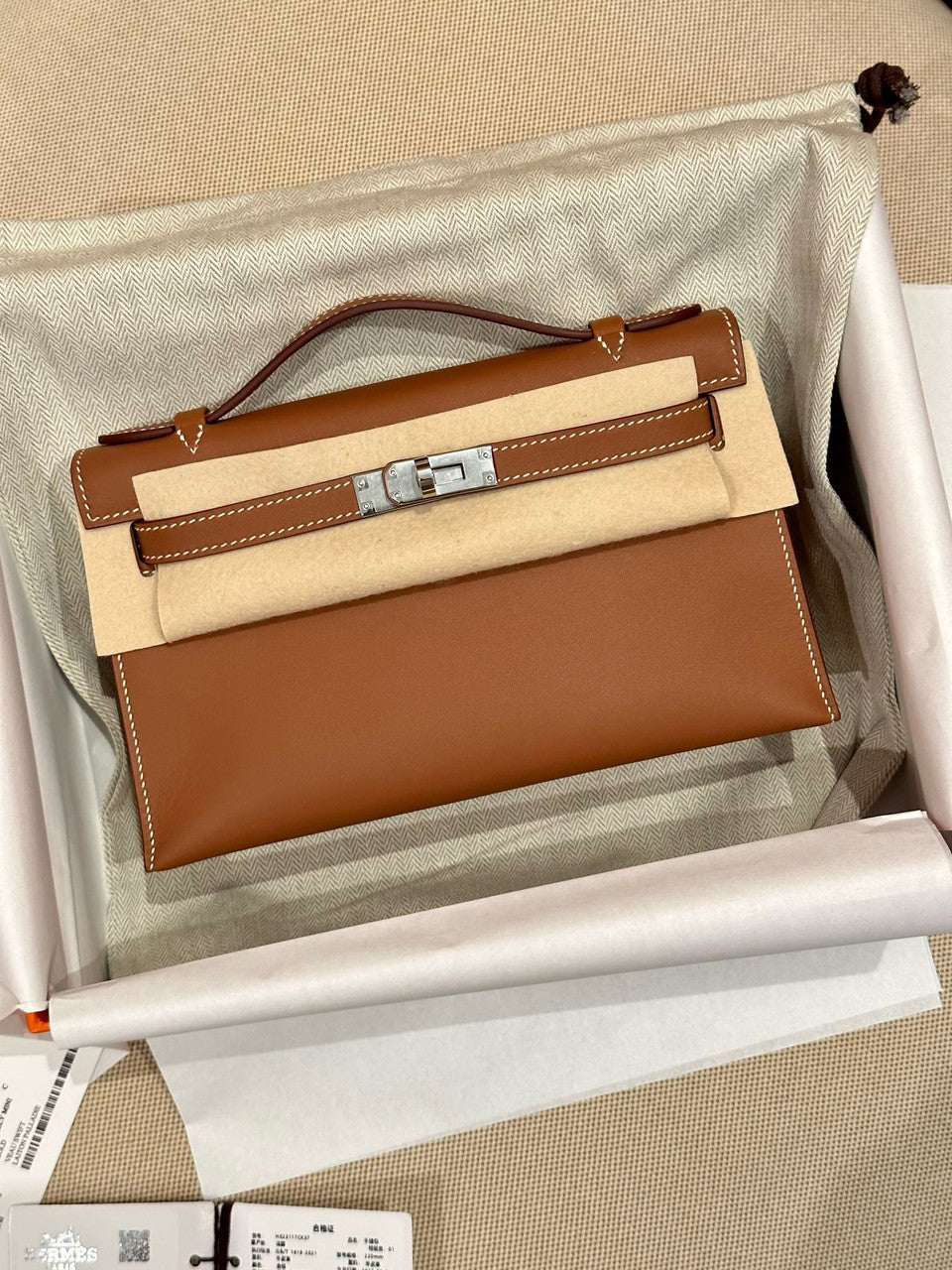 Hermès Gold Mini Kelly Pochette Swift leather Palladium hardware