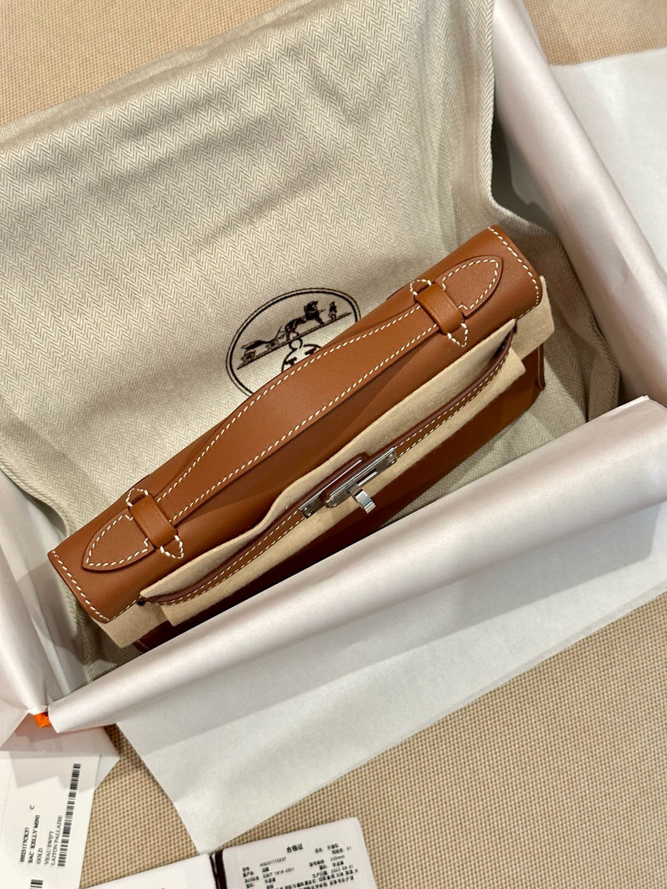 Hermès Gold Mini Kelly Pochette Swift leather Palladium hardware