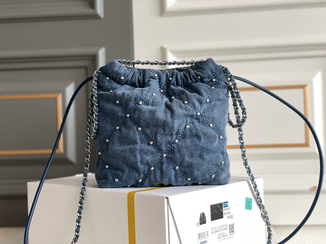 CHANEL 22 MINI HANDBAG Washed Denim