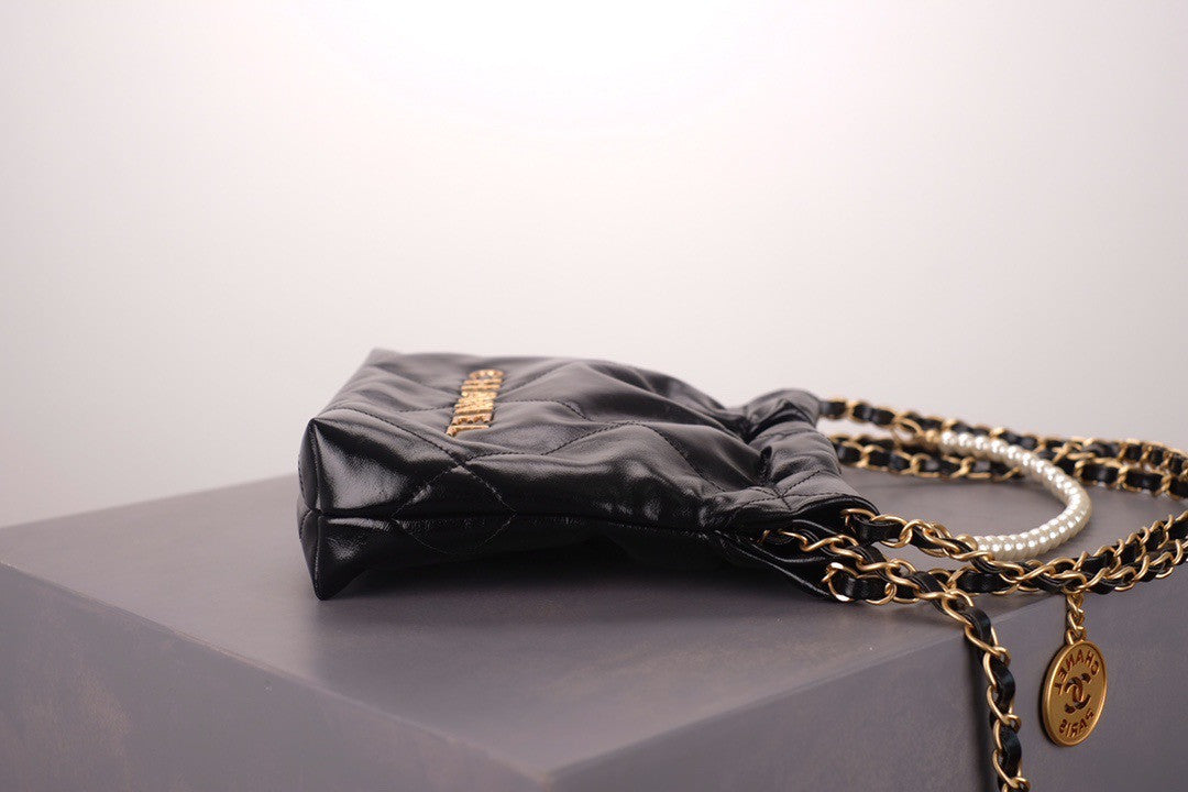 CHANEL 22 MINI HANDBAG GOLD LOGO BLACK SS2023 BLACK