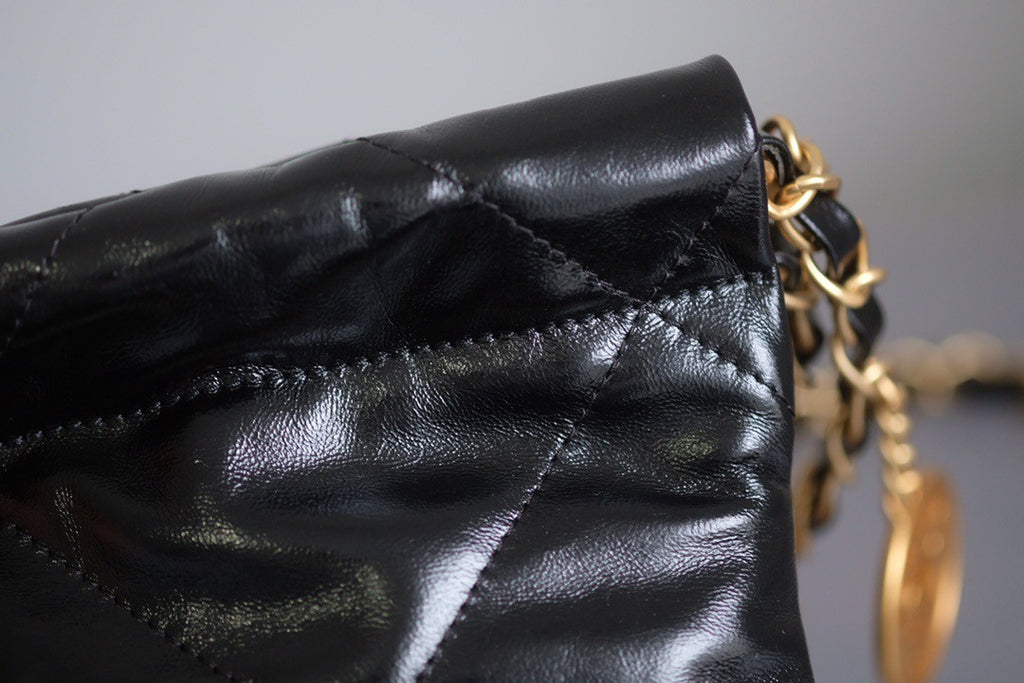 CHANEL 22 MINI HANDBAG GOLD LOGO BLACK SS2023 BLACK