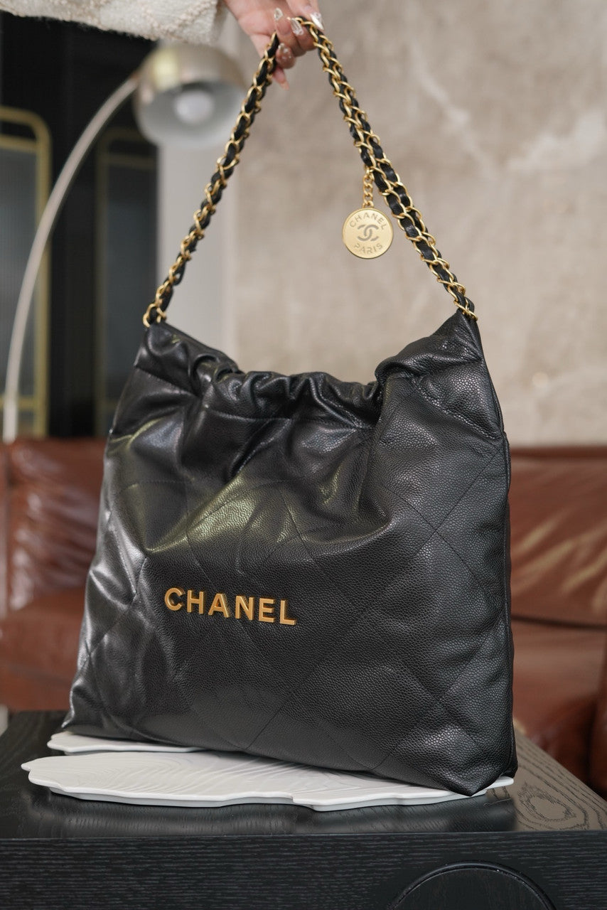 CHANEL 22 HANDBAG Caviar Black with Gold Hardware Medium SS 2024
