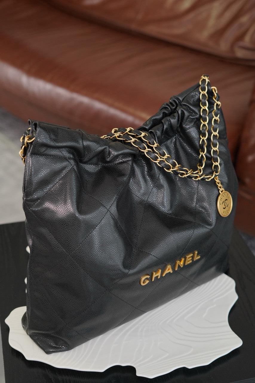 CHANEL 22 HANDBAG Caviar Black with Gold Hardware Medium SS 2024