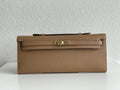 Hermes Kelly 31cm Cut Pochette gold Swift