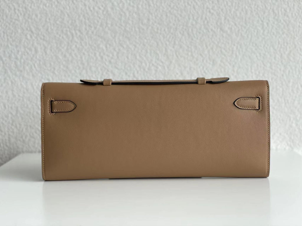 Hermes Kelly 31cm Cut Pochette gold Swift
