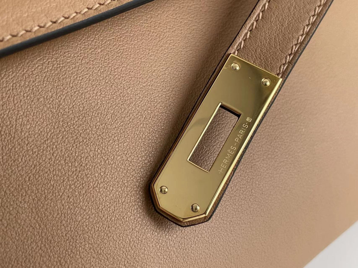 Hermes Kelly 31cm Cut Pochette gold Swift