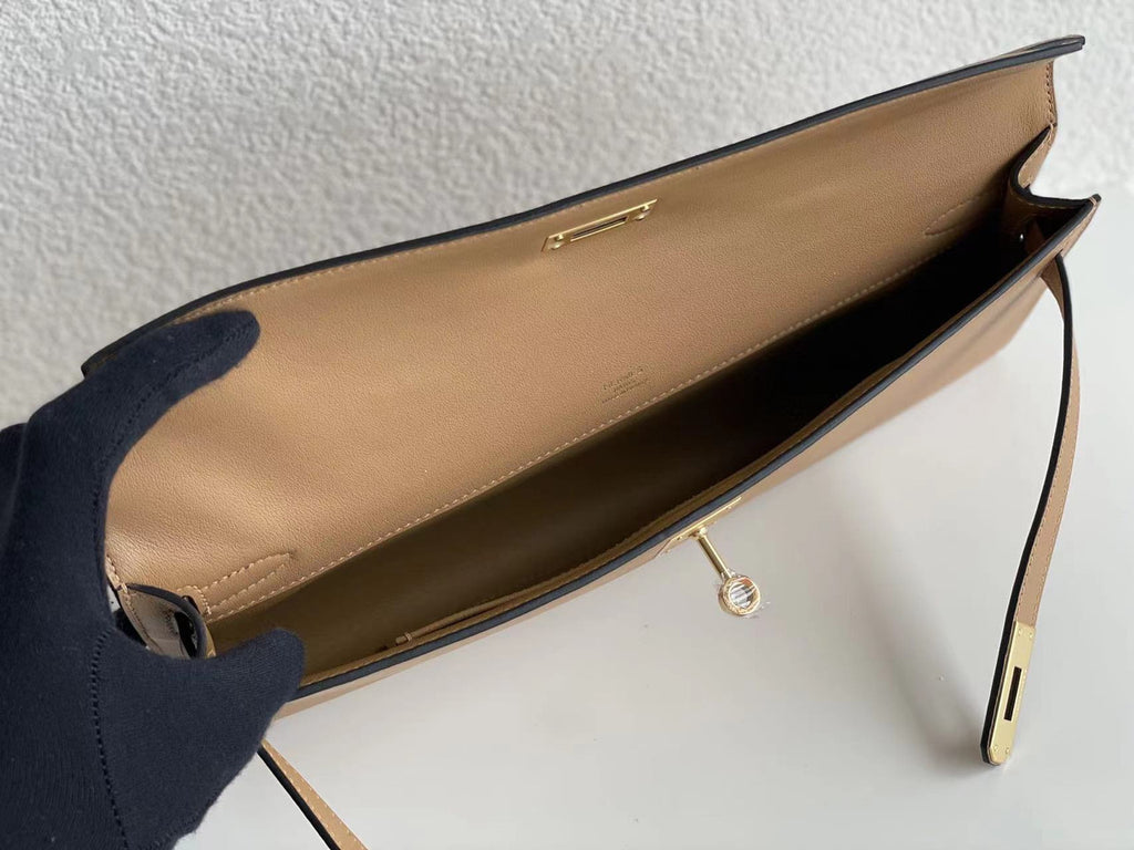 Hermes Kelly 31cm Cut Pochette gold Swift