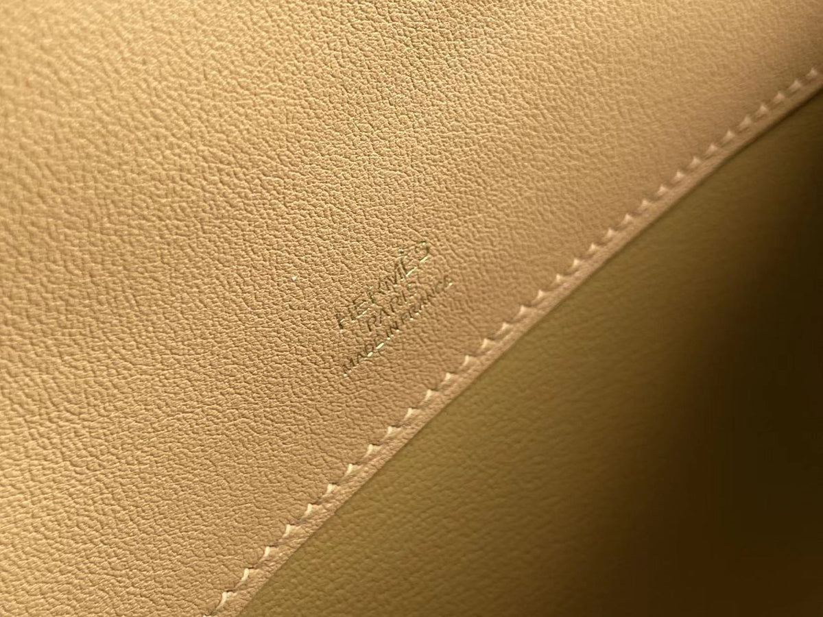 Hermes Kelly 31cm Cut Pochette gold Swift