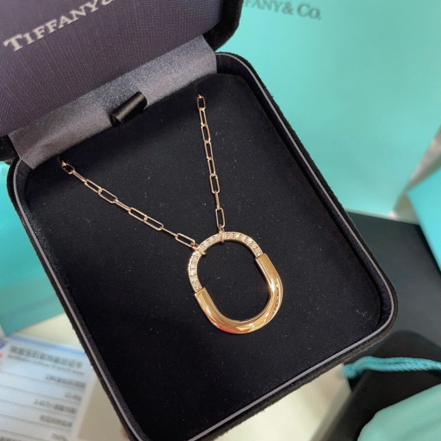 Tiffany Lock Pendant in Yellow Gold with Diamonds, Medium